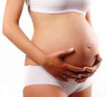 În timpul sarcinii, dureri de stomac, cum ar fi înainte de menstruație