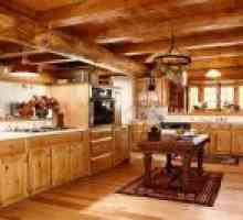Bucătărie interioară într-o casă din lemn
