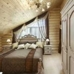 Interiorul dormitor într-o casă din lemn